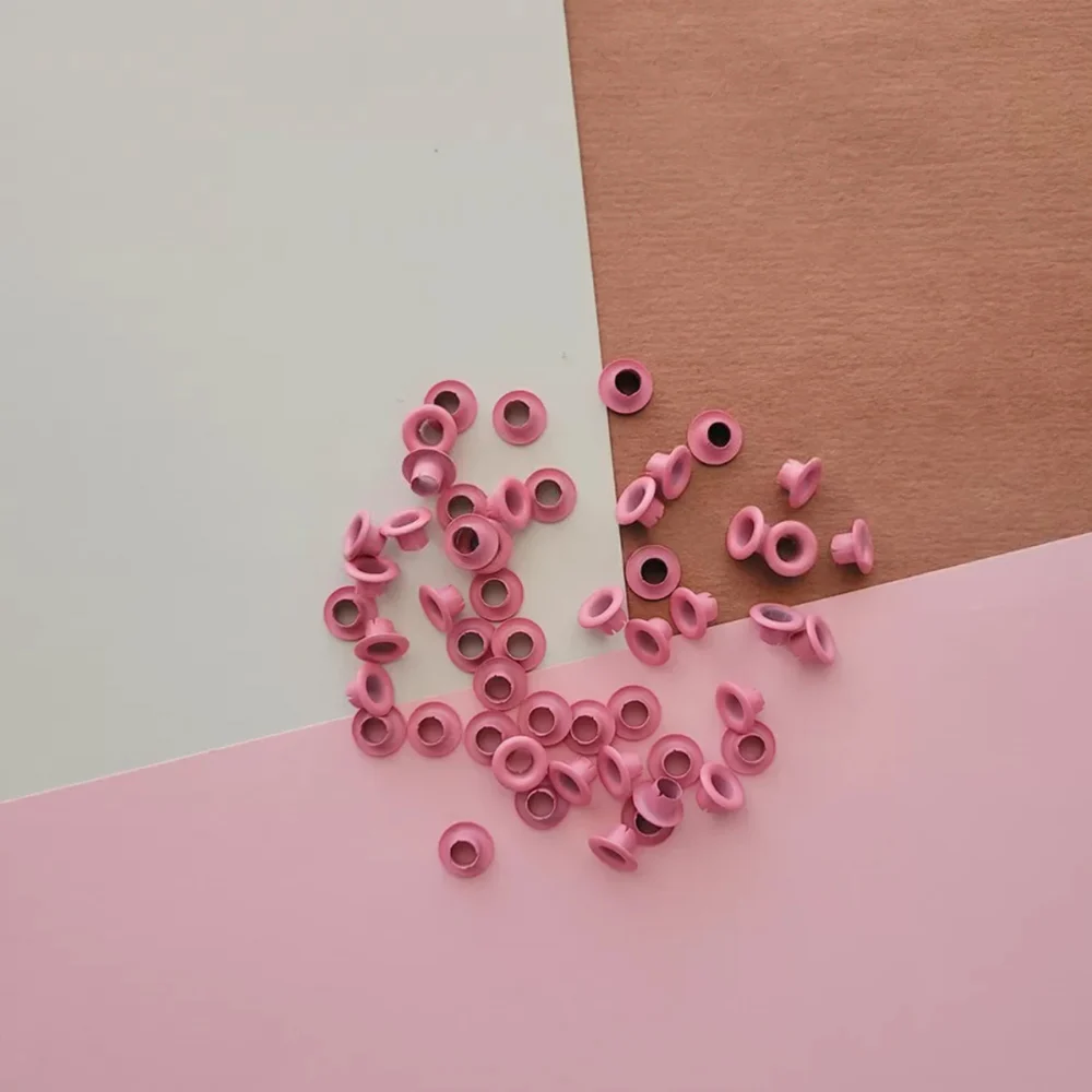 40.14.123_1000-1-1 Ojaliillos Aluminio (eyelet) 50 Pcs Rosa Pastel - Imagen 1