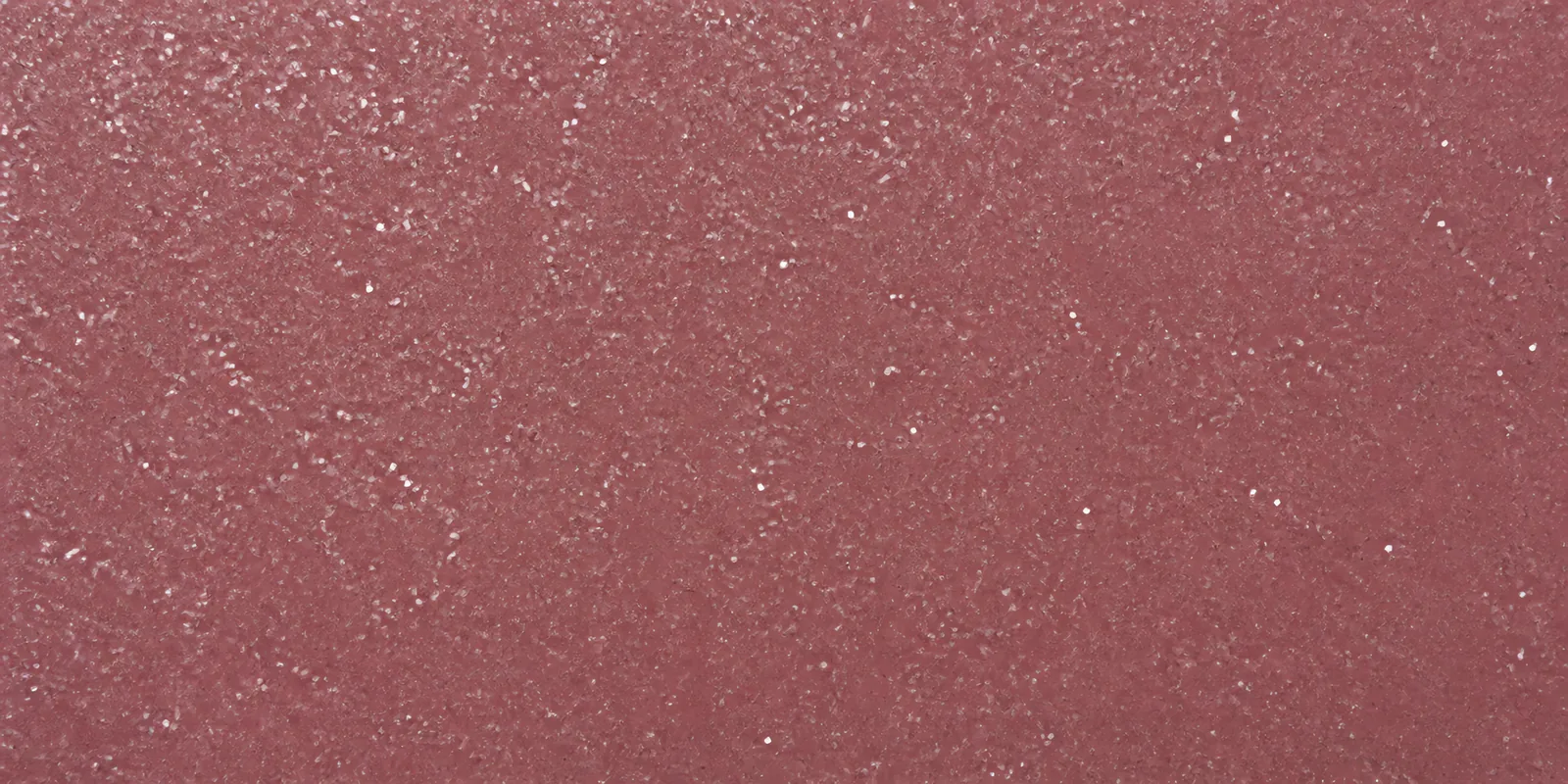 Macro de una hoja rosa champagne de Gliterina, con el glitter bajo el film plástico
