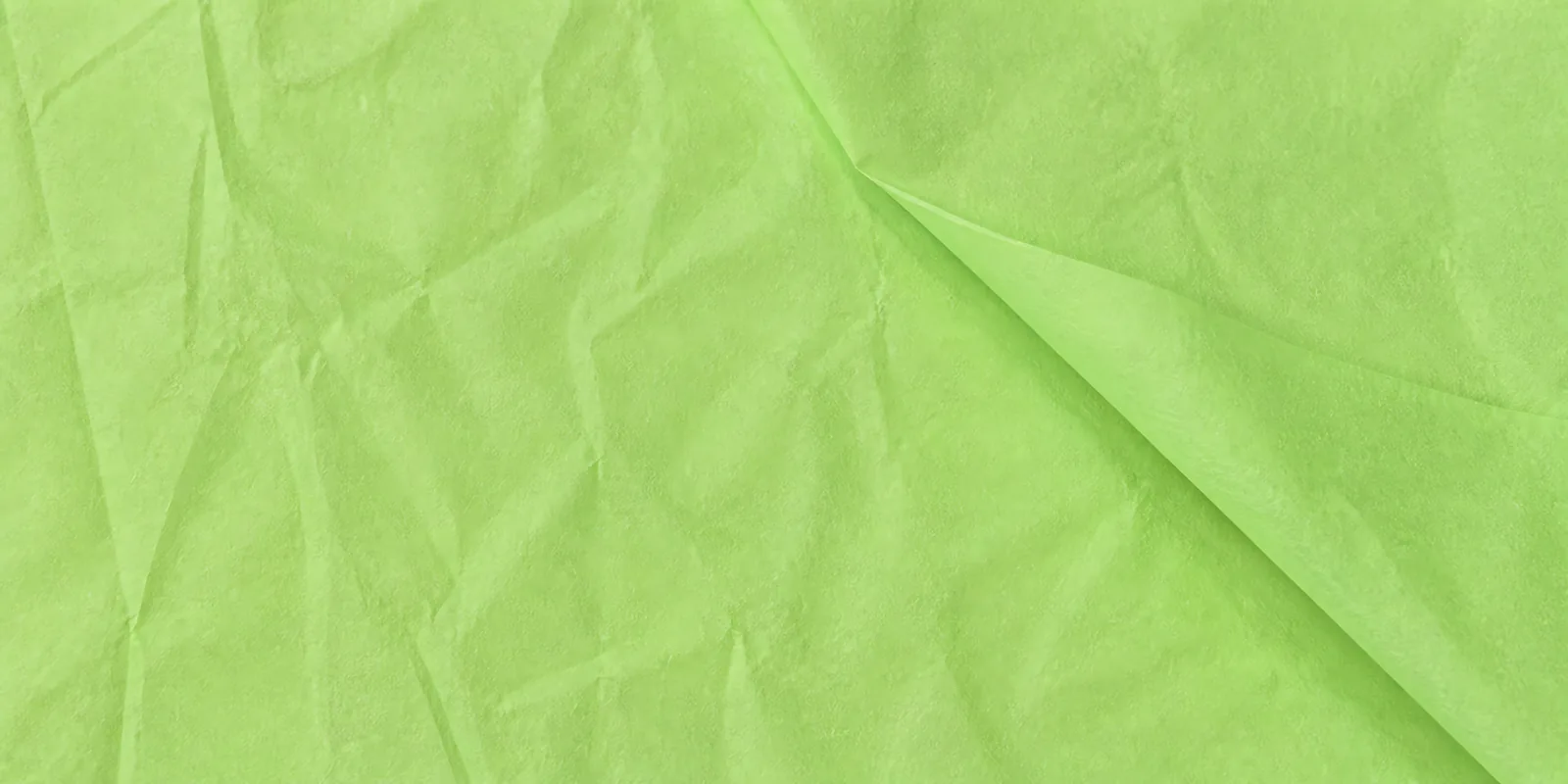 Textura del papel seda verde perlado, con sus arrugas finas y sus pliegues