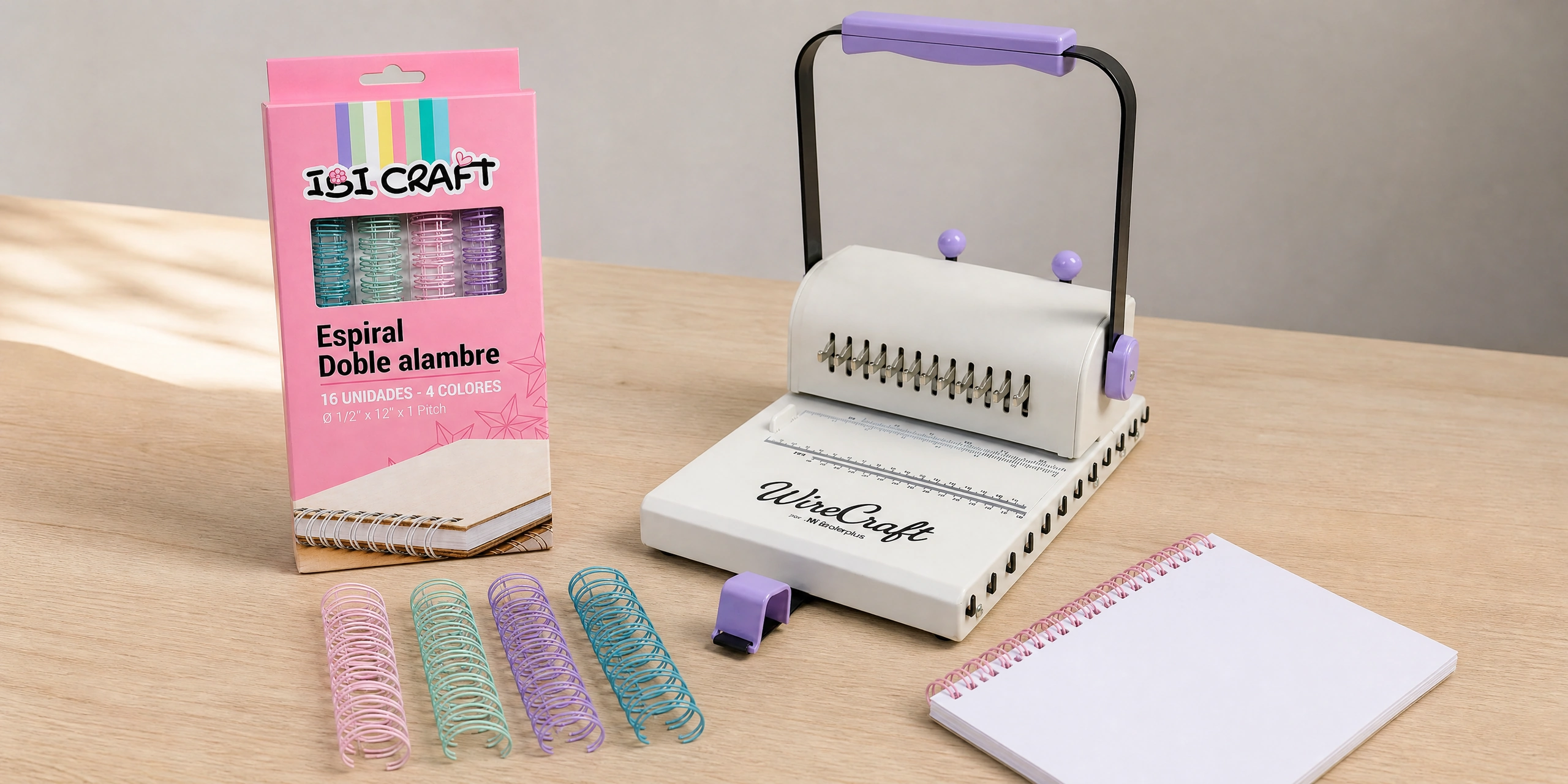Caja de diez anillos de alambre doble de 12 mm en colores pastel, con cuatro anillos delante y la anilladora detrás