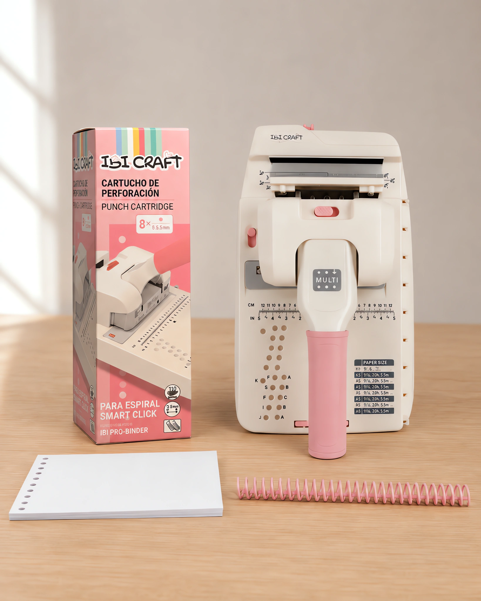 La caja del cassette Smart Click junto a la encuadernadora de cartuchos