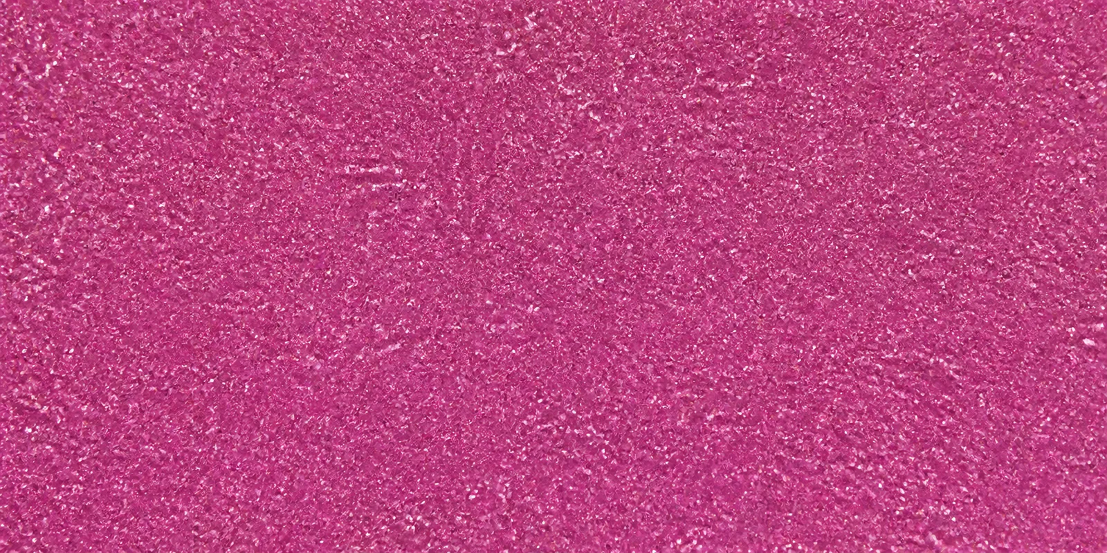 Macro del papel con glitter violeta orbe de cristal, con las partículas separadas brillando sobre la hoja