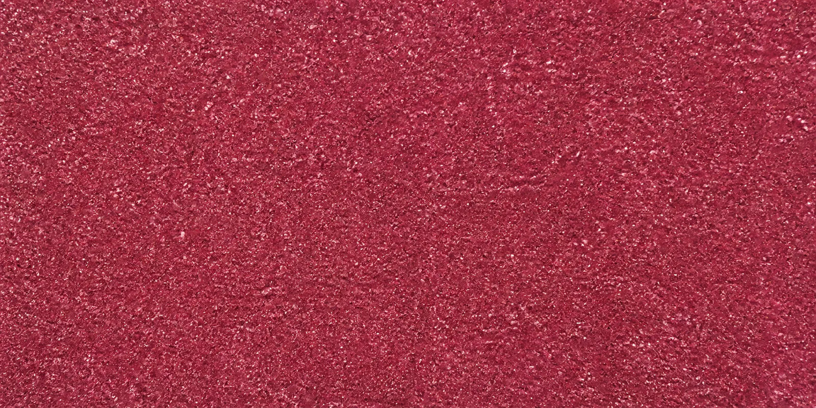 Macro del papel con glitter violeta valle de fantasia, con las partículas separadas brillando sobre la hoja