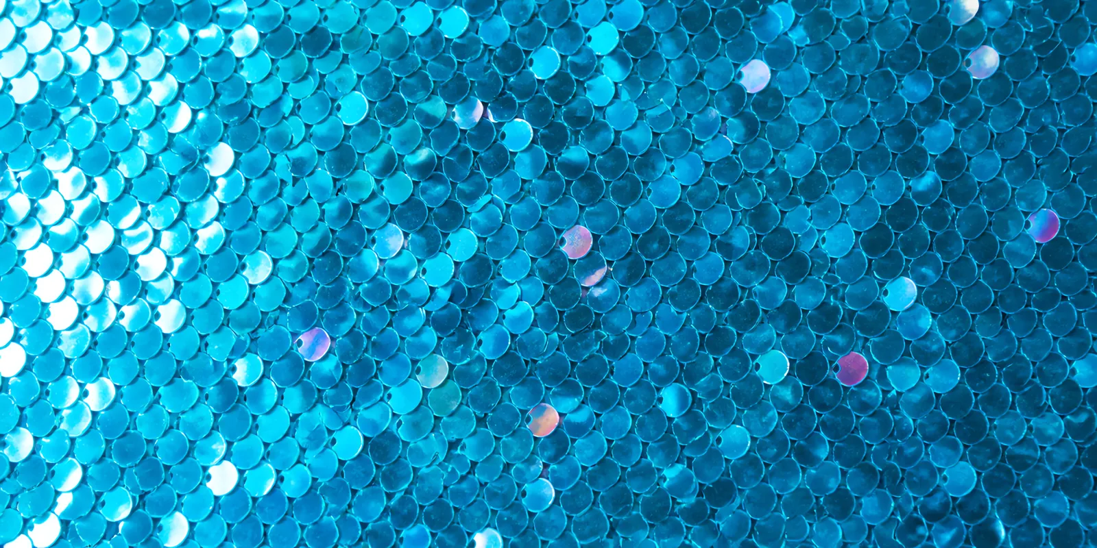 Detalle del papel Glamurina en el tono azul katy, con las escamas de glitter a la vista