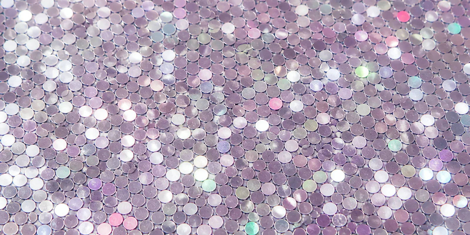Detalle del papel Glamurina en el tono iridiscentes dua, con las escamas de glitter a la vista