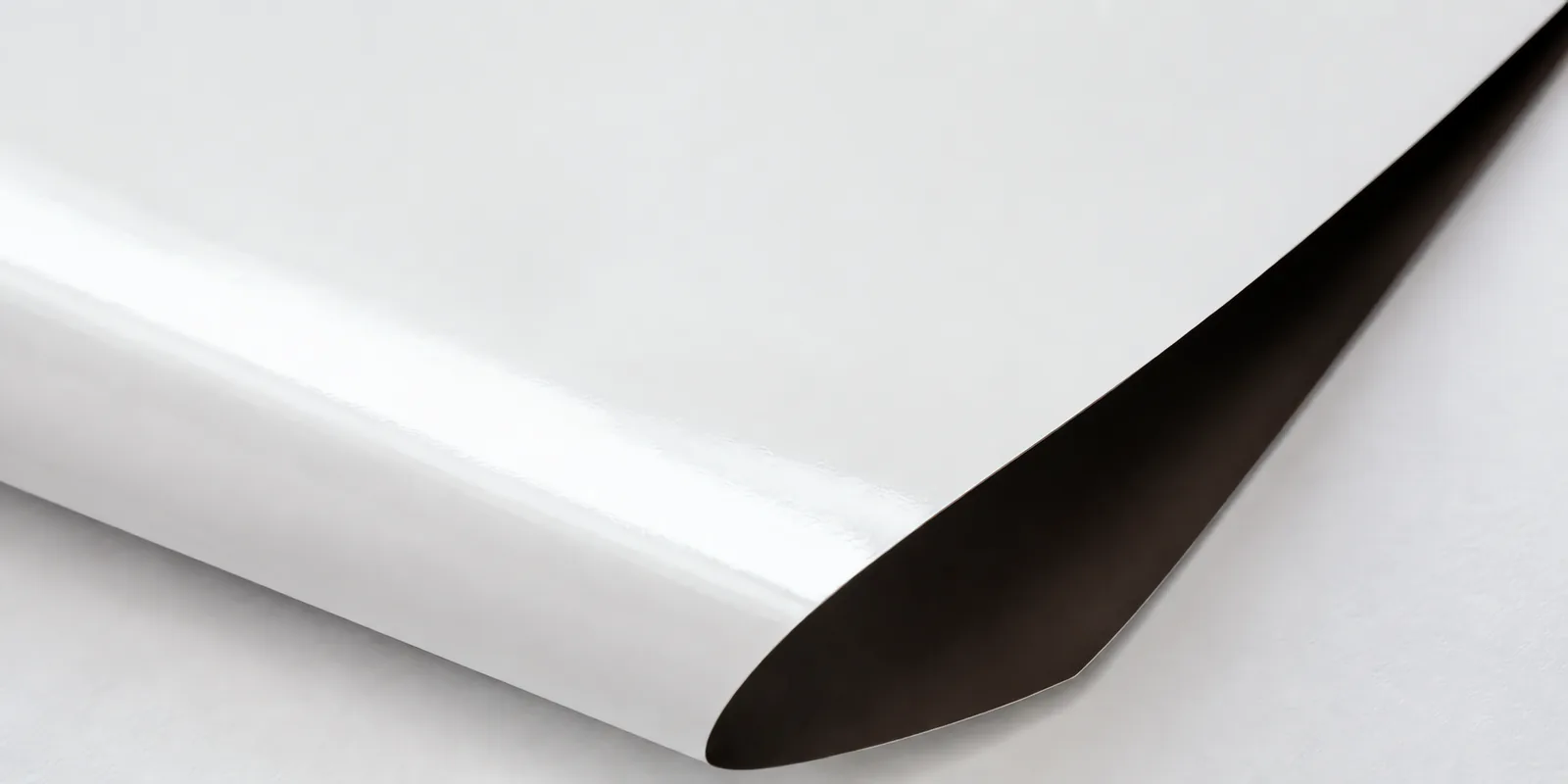 Textura del papel magnético: cara fotográfica brillante y dorso imantado